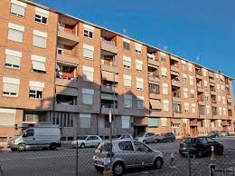 Il quartiere INA Casa di Rimini — mattoni a vista e cortili aperti lungo Via Dario Campana